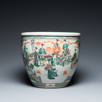 A Chinese famille verte fish bowl with female musicians in a garden, 19th C.