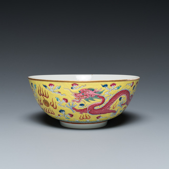 A Chinese yellow-ground famille rose 'dragon and phoenix' bowl, Xuantong mark and of the period