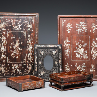 Two mother-of-pearl-inlaid wooden trays, two opium trays and an oval frame, China and/or Vietnam, 19th C.