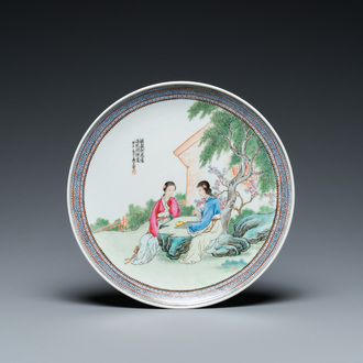 A Chinese famille rose dish with ladies playing go, signed Wanglong Fu 王隆夫, dated 1954