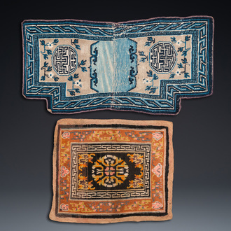 Two Chinese or Tibetan saddleback rugs, 19th C.