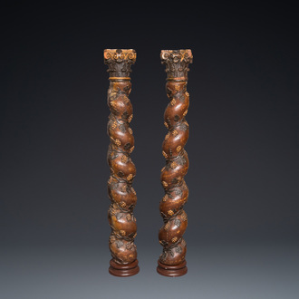 A pair of patinated wooden 'grapevine' columns, 18th C.