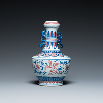 A Chinese blue, white and copper-red 'phoenix' vase, 19/20th C.