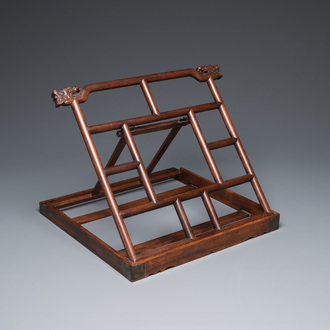 A Chinese foldable huali wooden book stand with brass mounts, Qing
