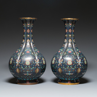 A pair of large Chinese cloisonné 'bats and shou' bottle vases, 19th C.