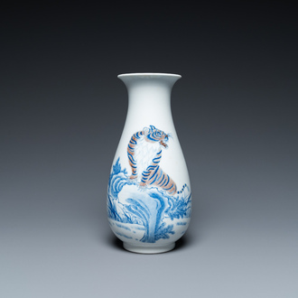 A Chinese blue, white and copper-red 'tiger' vase, Zhong Guo Jing De Zhen Zhi 中國景德鎮製 mark, 20th C.