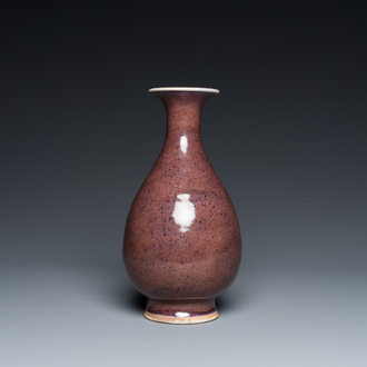 A Chinese speckled liver-red 'yuhuchunping' vase, 19th C.