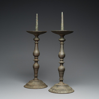 A pair of patinated bronze pricket candlesticks, France, 17th C.