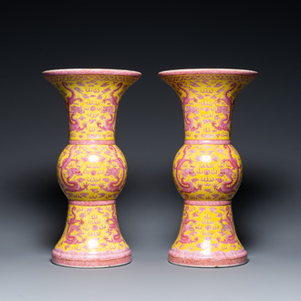 A pair of Chinese puce-enamelled yellow-ground 'gu' vases with dragons, Jia Xu Nian Zhi 甲戌年製 mark, dated 1874