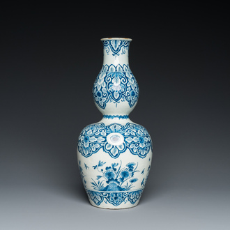 A Dutch Delft blue and white double gourd vase, 1st quarter 18th C.