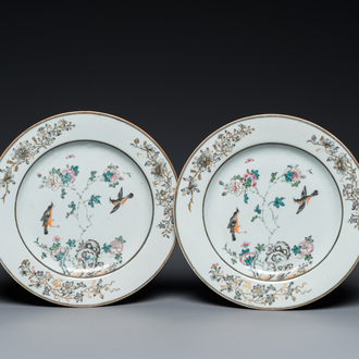 A pair of Chinese famille rose grisaille plates with birds among blossoming branches, Yongzheng/Qianlong