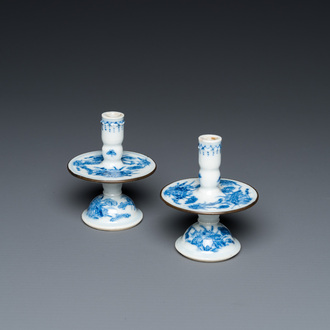 A pair of Chinese blue and white 'Bleu de Hue' candlesticks for the Vietnamese market, Kim Ngoc Cam Kee 金玉錦記 mark, 19th C.