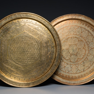 Two large Islamic Mamluk-style brass dishes, Egypt or Syria, 19th C.