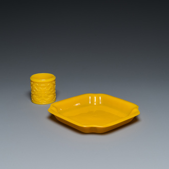 A Chinese yellow Peking glass chamfered dish and a cylindrical container, Qing/Republic