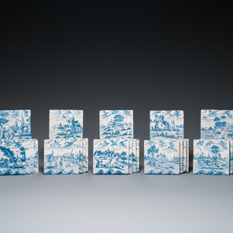 25 blue and white Dutch Delft tiles with continuous landscape scenes, 18th C.
