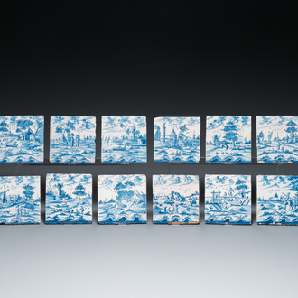 12 blue and white Dutch Delft tiles with continuous landscape scenes, 18th C.