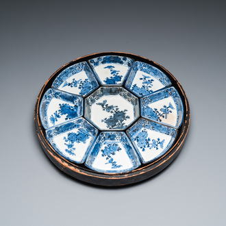 A Japanese blue and white Arita nine-piece sweetmeat set in its original lacquer box, Edo, 17/18th C.