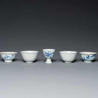 Four Chinese blue and white 'Hatcher cargo' bowls and three stem cups, Transitional period