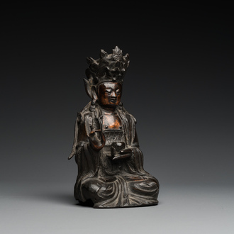 A Sino-Tibetan gilt-lacquered bronze Medicine Buddha or Bhaishajyaguru, Ming