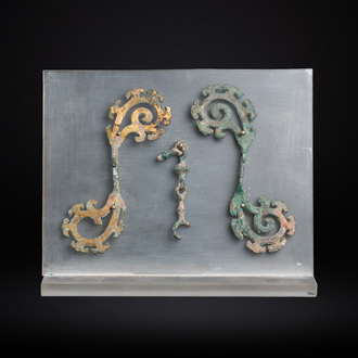 A pair of Chinese gilt bronze bridle ornaments, probably Han