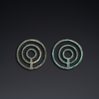 A pair of Chinese bronze bridle ornaments, Western Zhou, ca. 8th C. b.C.