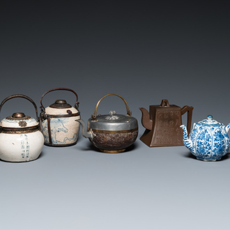 Two Vietnamese blue and white water pipes, a blue and white 'lotus' teapot, a Yixing teapot and a coconut teapot, Kangxi and later