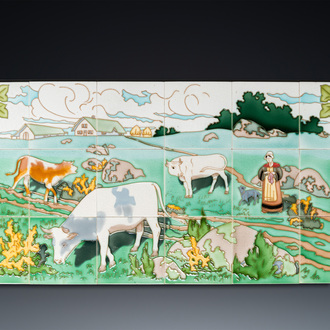 An Art Nouveau tile mural with a shepherdess and her cows in a meadow, Gilliot & Cie., Hemiksem
