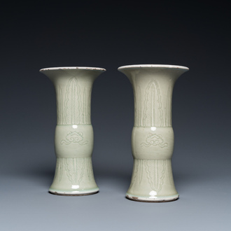 A pair of Chinese celadon-glazed 'gu' vases, 18th C.