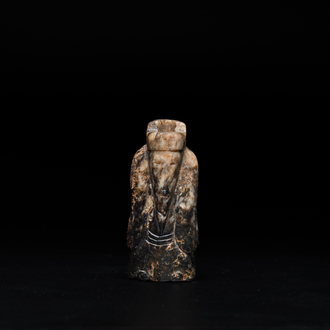 A Chinese black and grey jade figural pendant, Han Dynasty