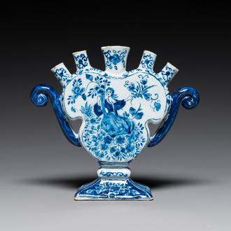 A blue and white Dutch Delft heart-shaped tulip vase with a lady with cornucopia, 18th C.