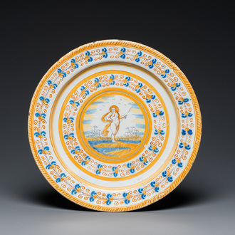 A blue, white and yellow Dutch Delft 'putto' dish, Verstraeten workshop, Haarlem, ca. 1640-1660