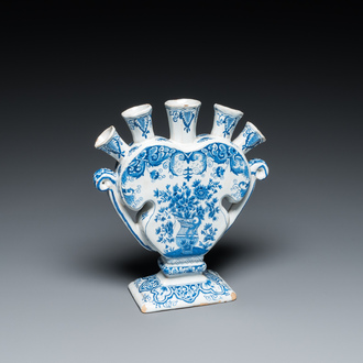 A heart-shaped Dutch Delft blue and white tulip vase with flower vases, 19th C.