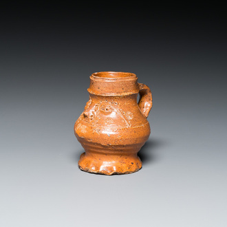 A stoneware 'pointy nose face' jug, probably Raeren, 15/16th C.