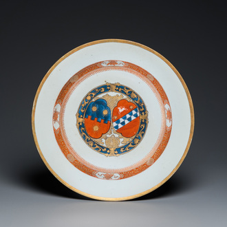 A Chinese famille rose armorial dish in iron-red, gilt and blue and white, Qianlong