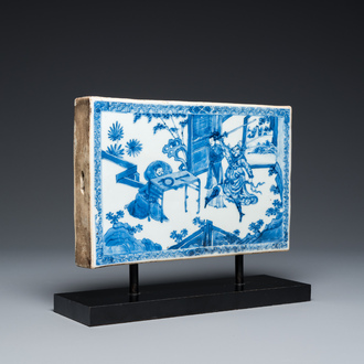 A Chinese rectangular blue and white 'beheading' tile, Kangxi