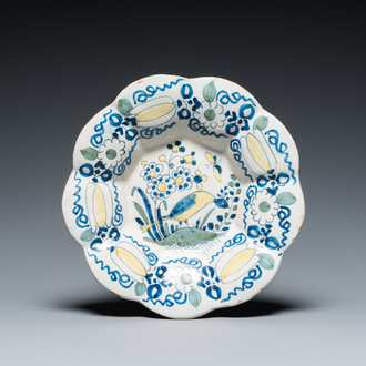 A polychrome Dutch Delft lobed 'bird' dish, late 17th C.