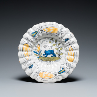 A polychrome Dutch Delft lobed 'lion' dish, late 17th C.