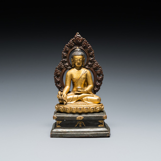 A Sino-Tibetan gilt and silvered copper alloy Medicine Buddha or Bhaishajyaguru, 19th C.