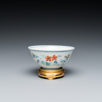 A Chinese doucai bowl with floral design, Yongzheng mark and possibly of the period