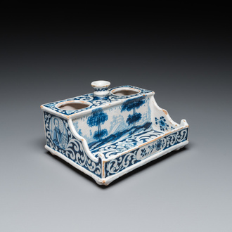 A Delft-style blue and white faience inkwell, probably Germany, signed and dated 1715