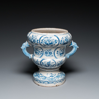 A large blue and white two-handled Frisian Delftware jardinière with dolphin handles, Makkum, 18th C.