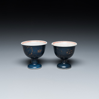 A pair of Chinese powder-blue stem cups with gilt decoration, Kangxi