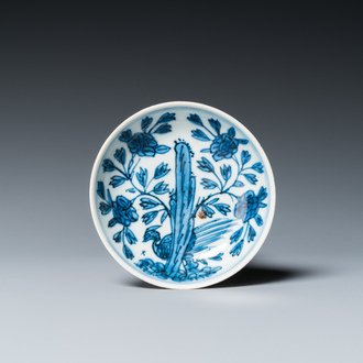 A Chinese blue and white saucer with a pheasant behind a rock, 'rabbit' mark, Wanli