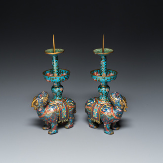 A pair of Chinese cloisonné candlesticks in the shape of pixiu, Qing
