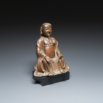 A Chinese bronze Guandi with traces of red lacquer, Ming