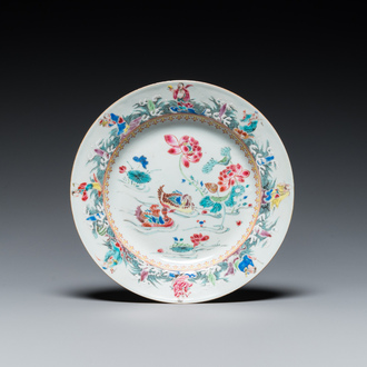 Assiette en porcelaine de Chine famille rose à décor de canards et d'immortels, Yongzheng