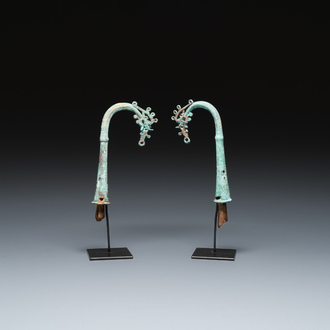 A pair of Chinese bronze finials, Warring States Period, 5th/3rd C. b.C.