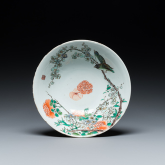 A Chinese famille verte 'magpies and prunus' bowl, Kangxi