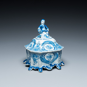 A Dutch Delft blue and white tobacco box with a nobleman holding a roll of tobacco, 2nd half 18th C.