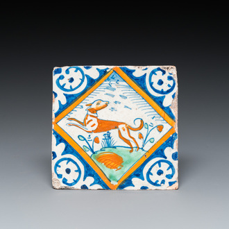 A polychrome Dutch maiolica tile with a dog, ca. 1600